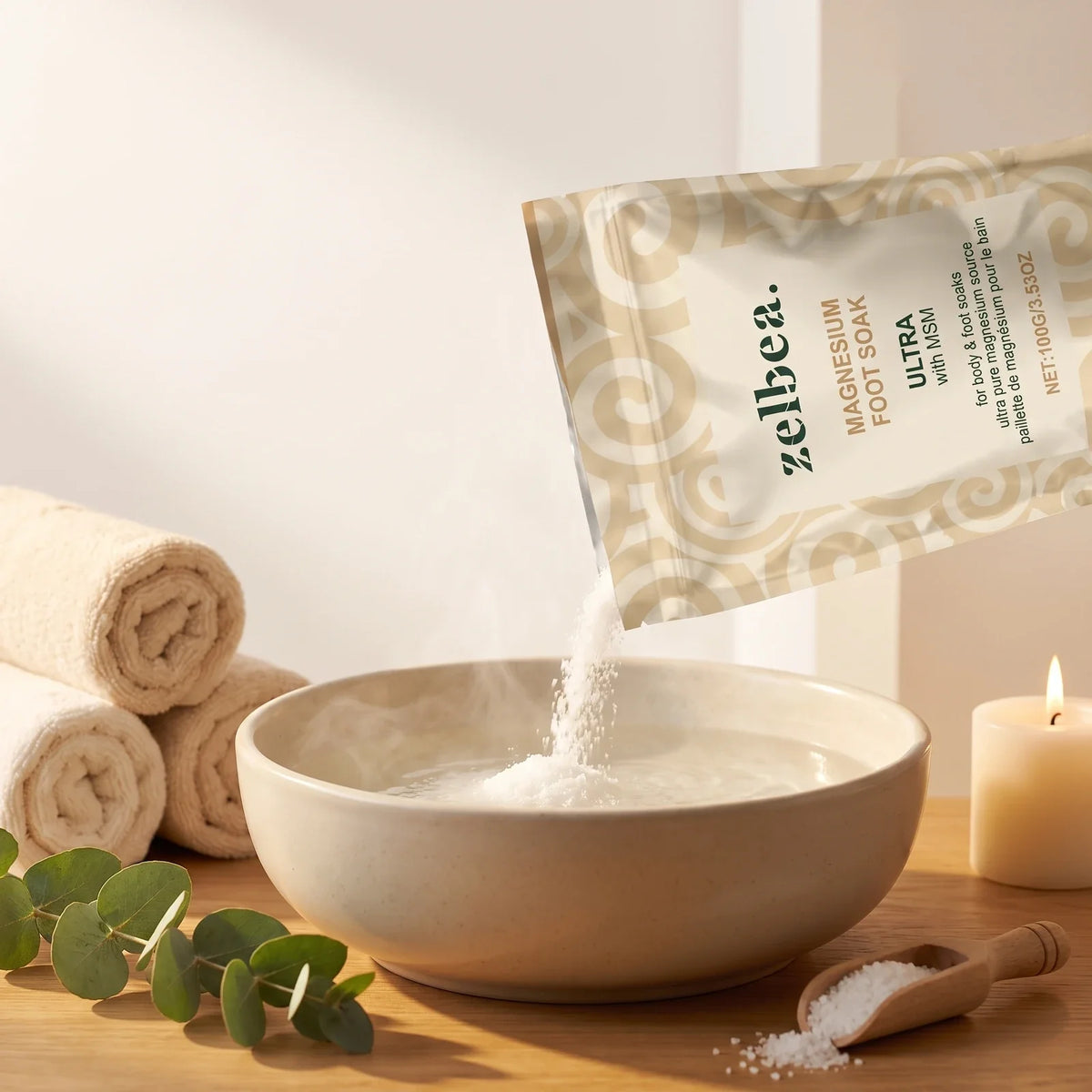 Pouring Zelbea magnesium foot soak into a warm spa basin